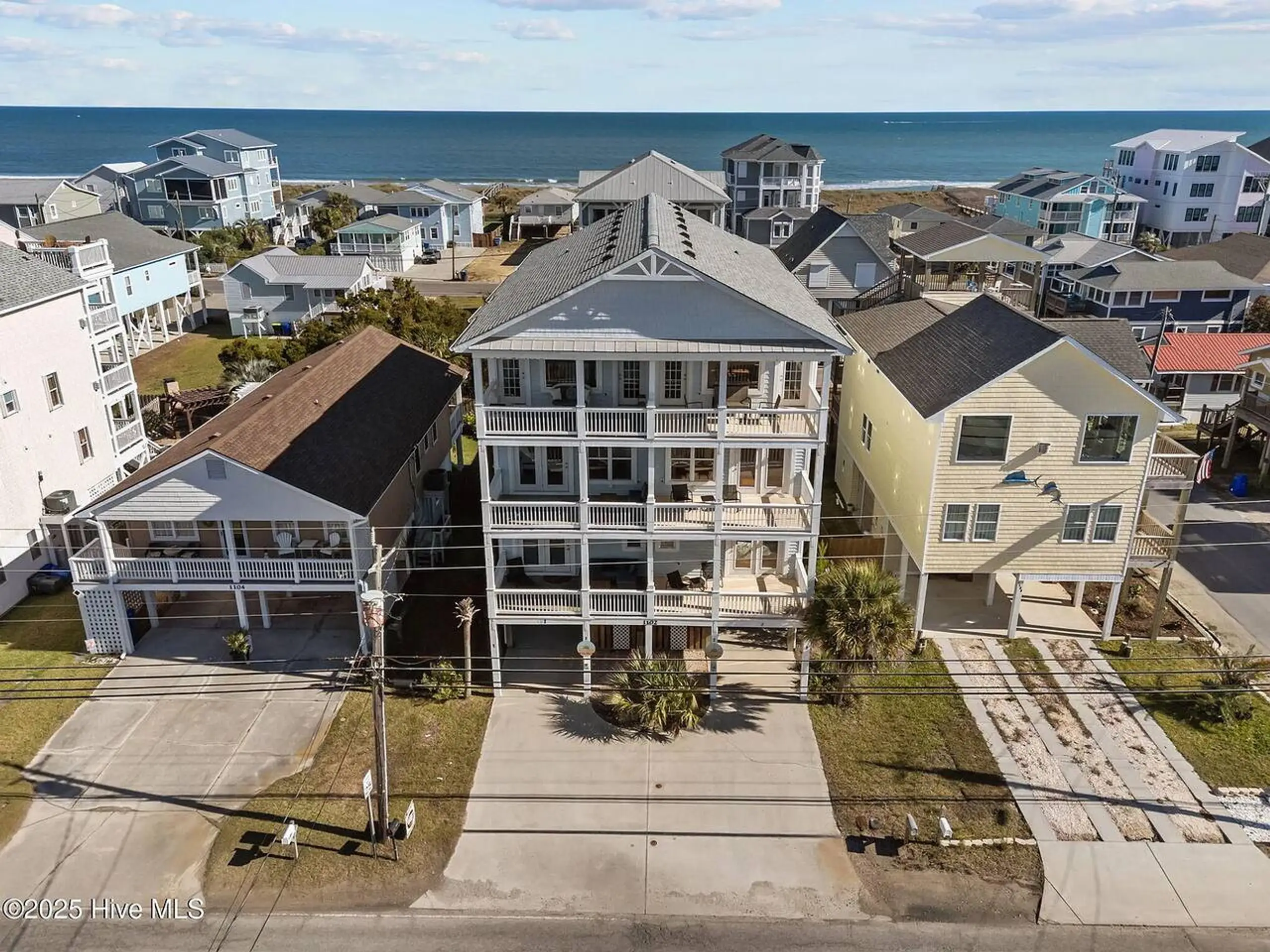 Aerial view of beachfront multi-story house