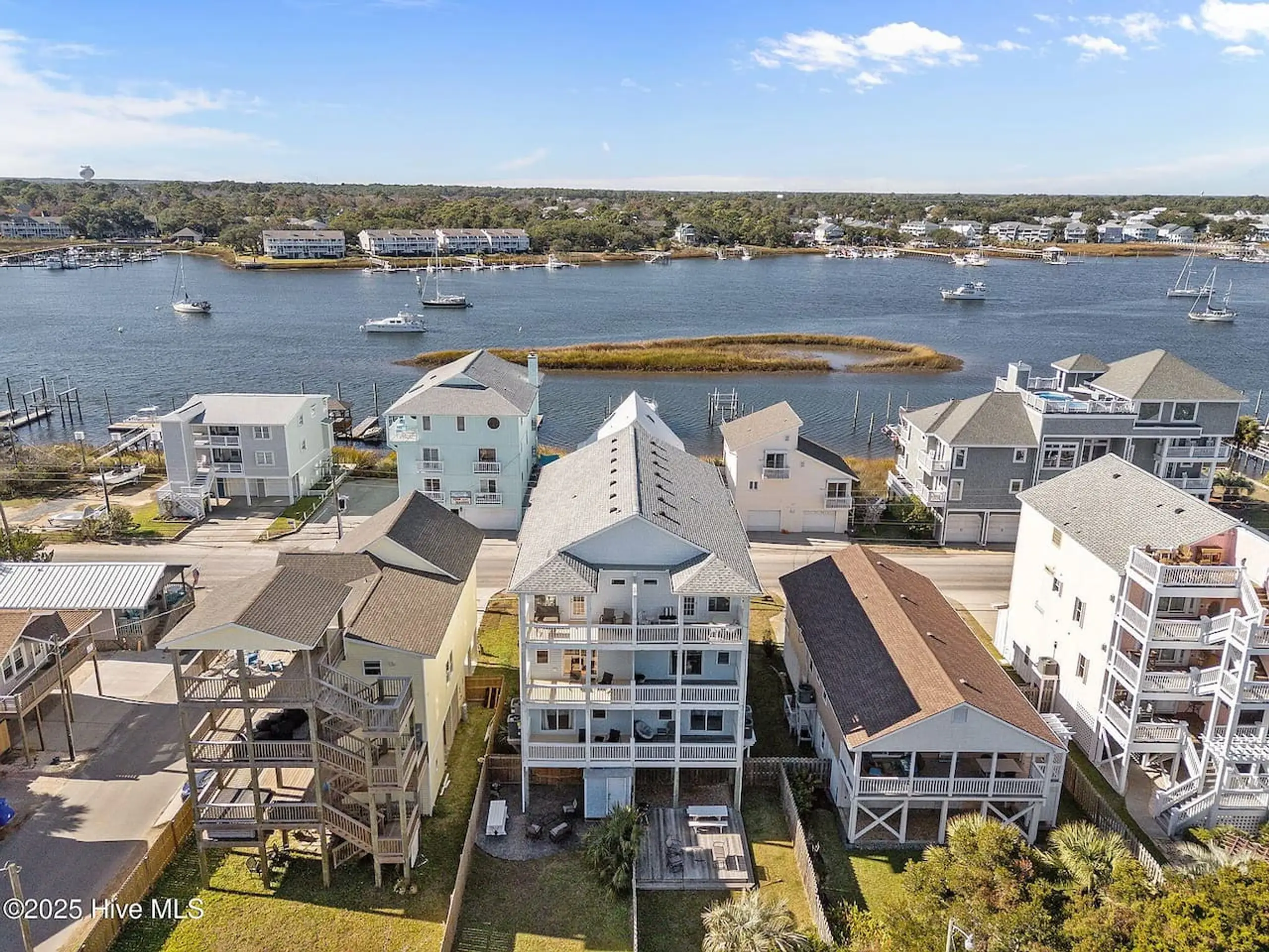 Aerial view of coastal homes and marina