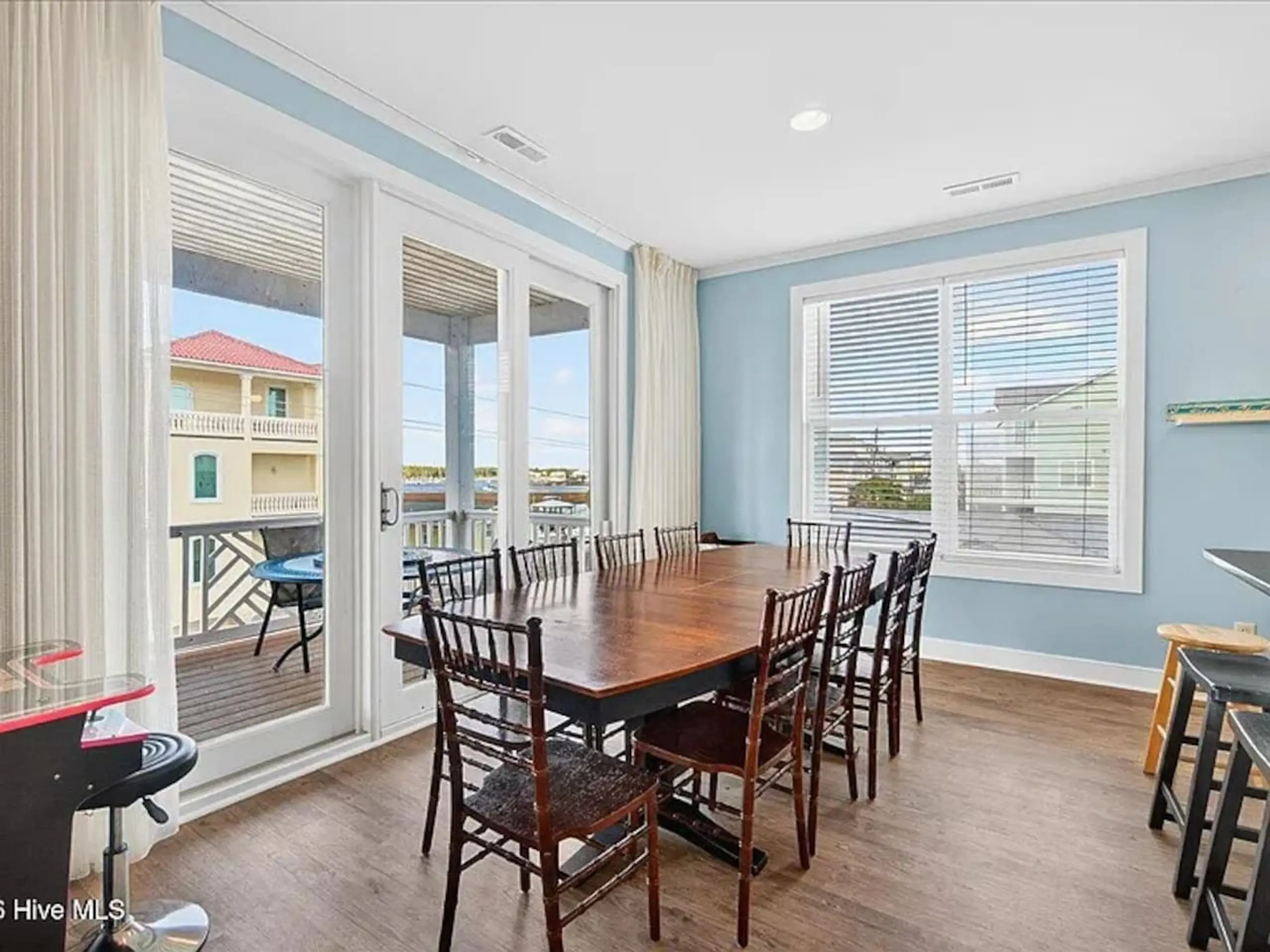 Bright dining room with wooden table