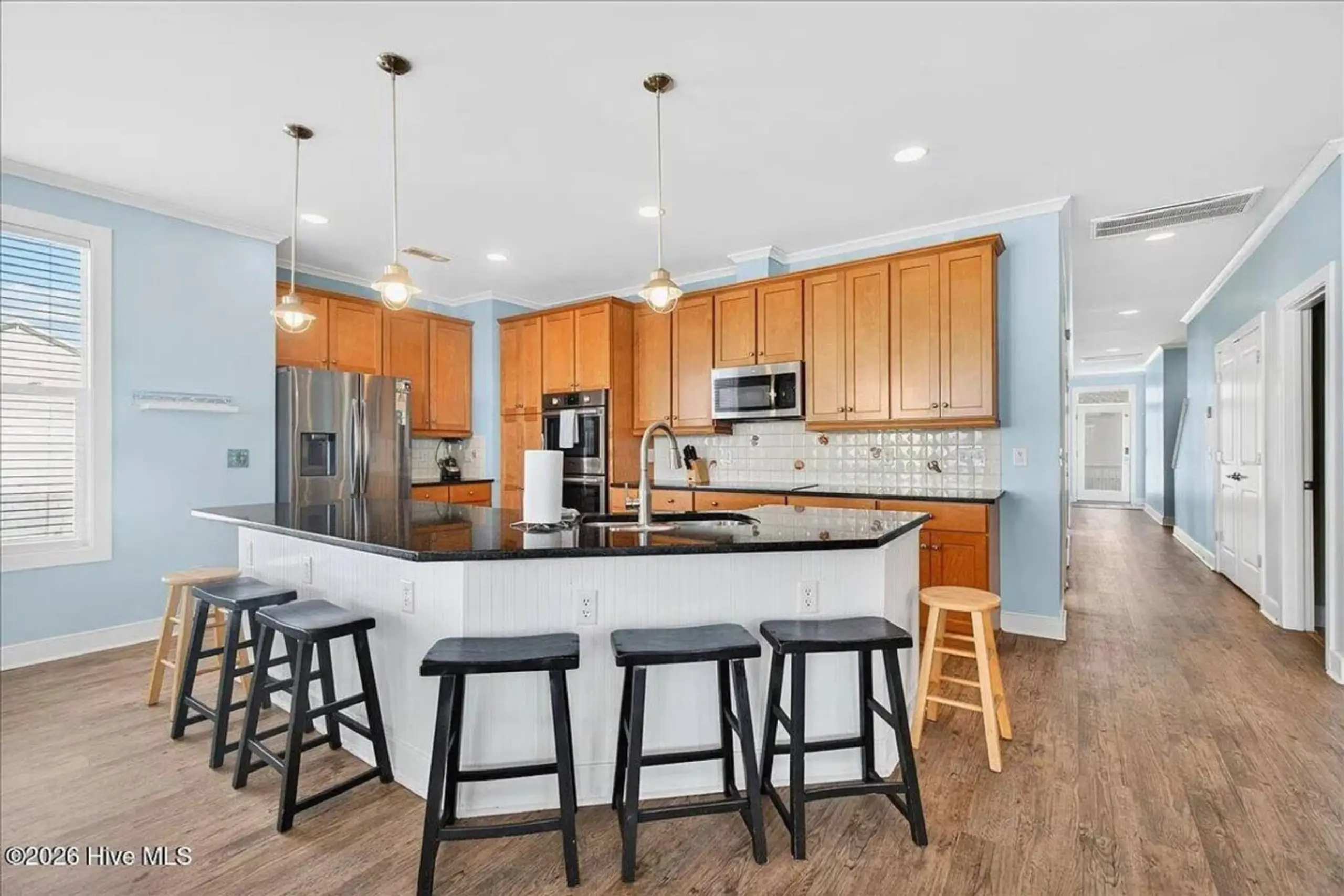 Modern kitchen with island and bar stools